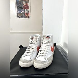 White and orange Nike blazers